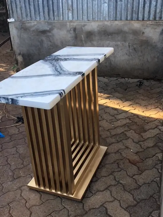 Marble-top console with gold frame