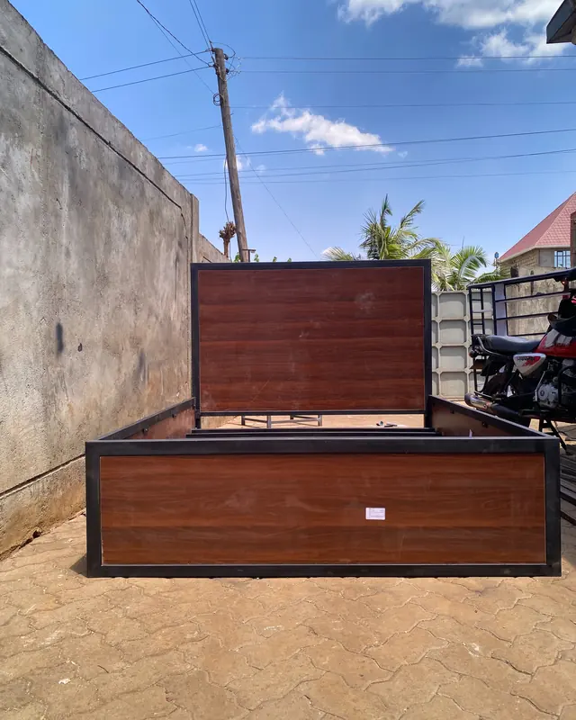 Walnut and matte black bed