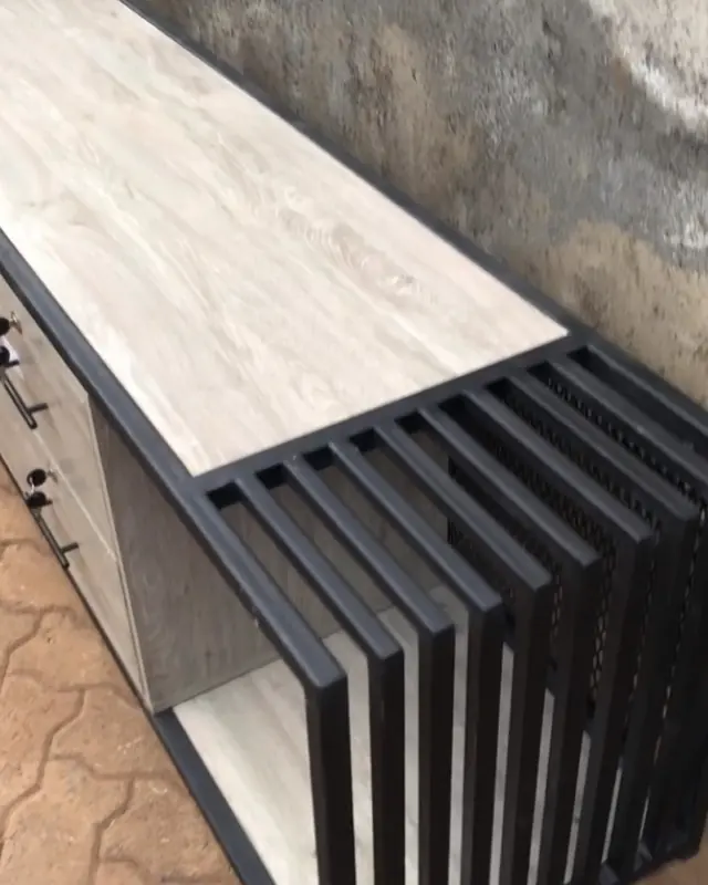Slatted TV stand with a light oak top