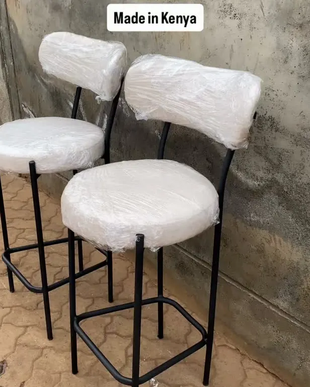 Pair of cushioned metal bar seats