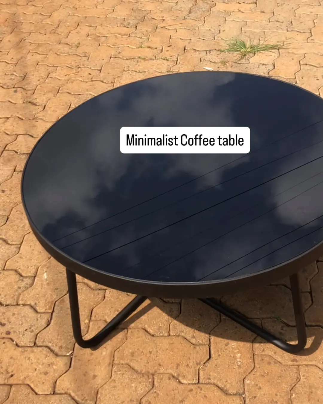 Minimalist round black coffee table