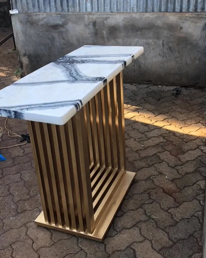 Marble-top console table with gold frame